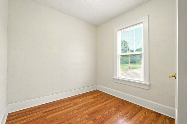 411 Grace St, Mansfield, OH 44902 - empty room featuring baseboards and wood finished floors