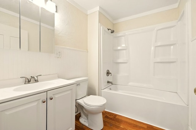 411 Grace St, Mansfield, OH 44902 - bathroom with wood finished floors, wainscoting, toilet, vanity, and washtub / shower combination
