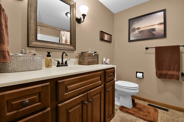 full bathroom with vanity, baseboards, tile patterned flooring, toilet, and visible vents