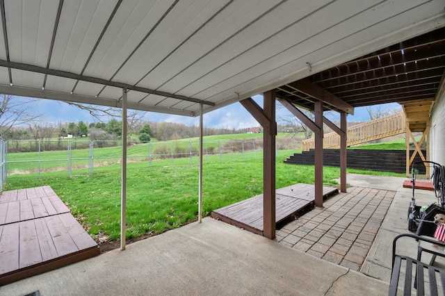 view of patio / terrace with a rural view and a fenced backyard
