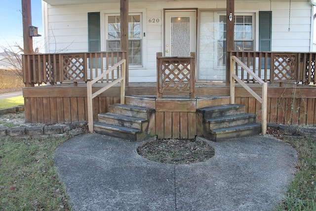 doorway to property with a porch