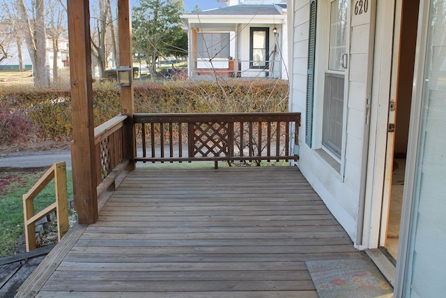 deck with covered porch