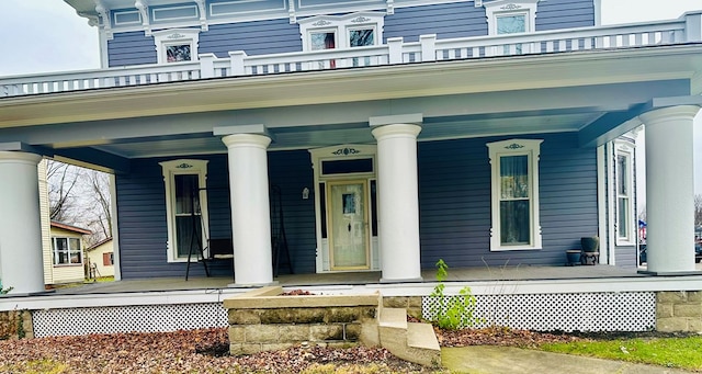 doorway to property with a porch