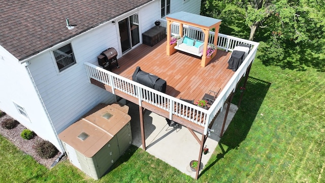 135 W Smiley Ave, Shelby, OH 44875 - wooden deck featuring a lawn
