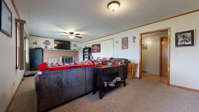 135 W Smiley Ave, Shelby, OH 44875 - living area featuring a ceiling fan, carpet floors, ornamental molding, and a brick fireplace