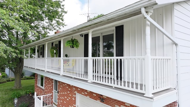 135 W Smiley Ave, Shelby, OH 44875 - view of home's exterior with board and batten siding and brick siding