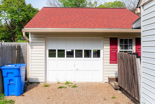 garage featuring fence