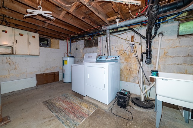 unfinished basement featuring washing machine and clothes dryer and water heater