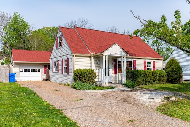 view of front of house with a garage and aphalt driveway