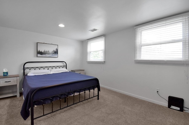 bedroom featuring carpet