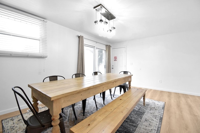 dining area with light hardwood / wood-style flooring