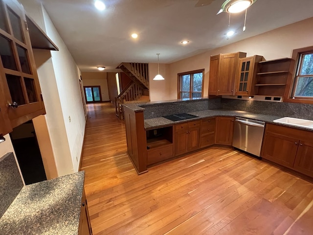 kitchen with dishwasher, open shelves, light wood-style flooring, and brown cabinetry