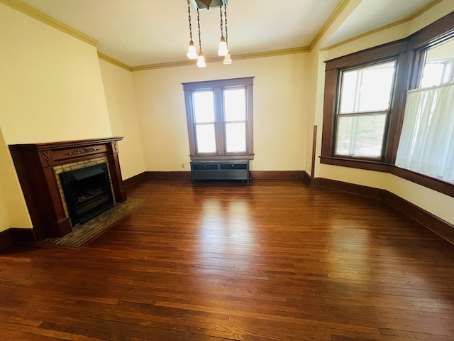unfurnished living room with a fireplace with flush hearth, dark wood-style flooring, ornamental molding, and baseboards