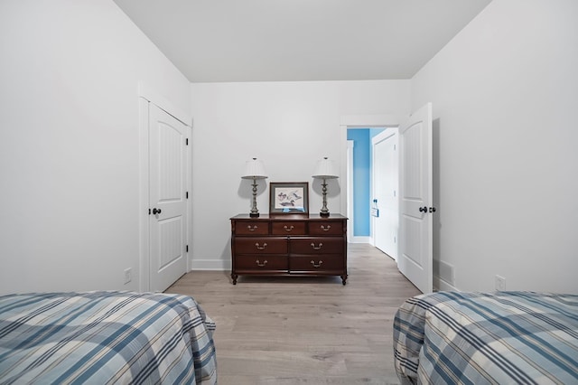 7326 State Route 19, Mount Gilead, OH 43338 - bedroom featuring light wood-type flooring and baseboards