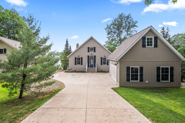 7326 State Route 19, Mount Gilead, OH 43338 - view of front facade featuring a front lawn, driveway, entry steps, and a chimney