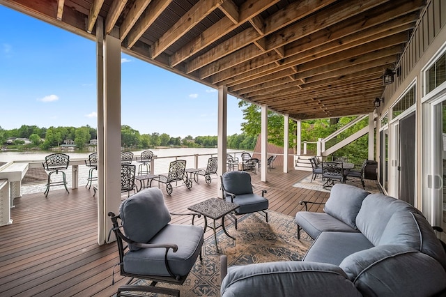 7326 State Route 19, Mount Gilead, OH 43338 - wooden terrace featuring a water view, an outdoor hangout area, stairs, view of scattered trees, and outdoor dining area
