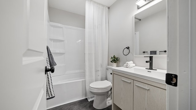 full bathroom featuring toilet, vanity, and shower / bathtub combination with curtain