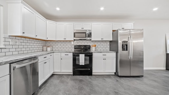 kitchen with light stone counters, recessed lighting, stainless steel appliances, white cabinetry, and decorative backsplash