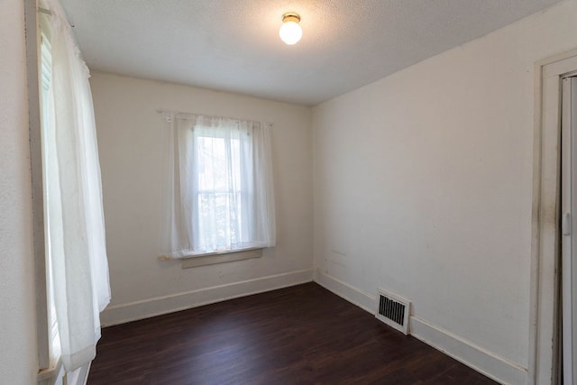 942 Lenox Ave, Mansfield, OH 44906 - empty room featuring dark wood-style floors and baseboards