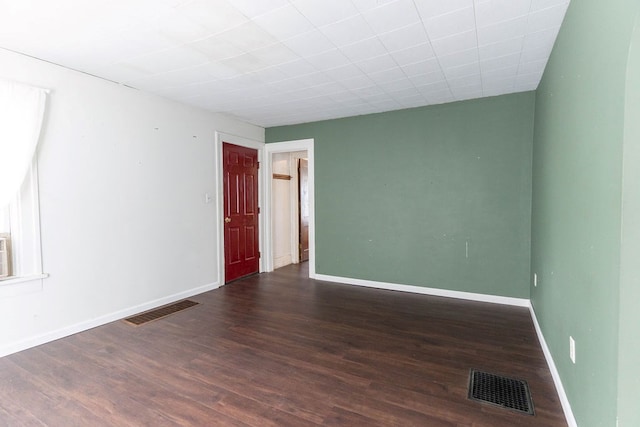 942 Lenox Ave, Mansfield, OH 44906 - empty room with wood finished floors and baseboards
