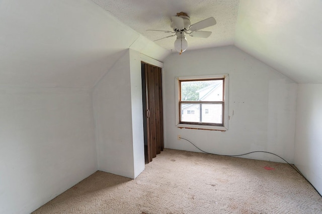 942 Lenox Ave, Mansfield, OH 44906 - additional living space featuring light colored carpet, lofted ceiling, and a ceiling fan