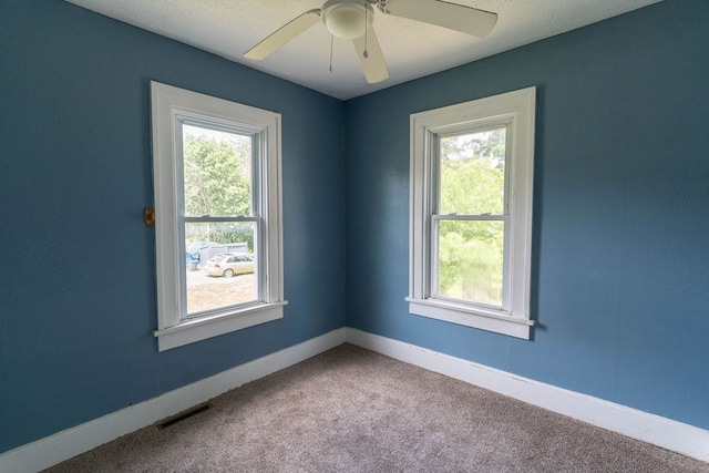 942 Lenox Ave, Mansfield, OH 44906 - spare room with carpet floors and ceiling fan