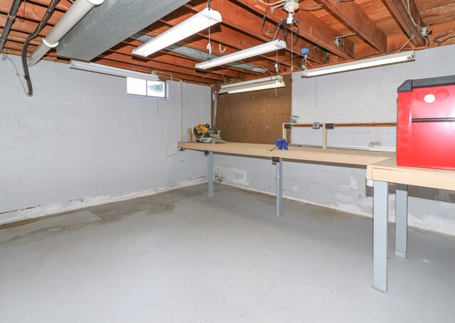 basement with a workshop area