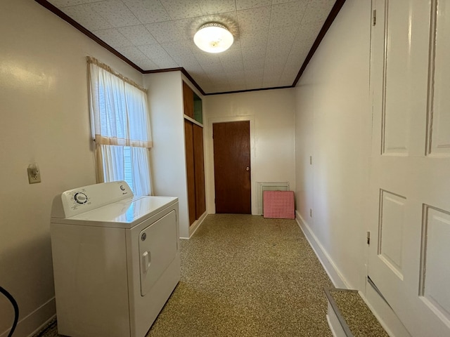 washroom featuring washer / dryer and ornamental molding