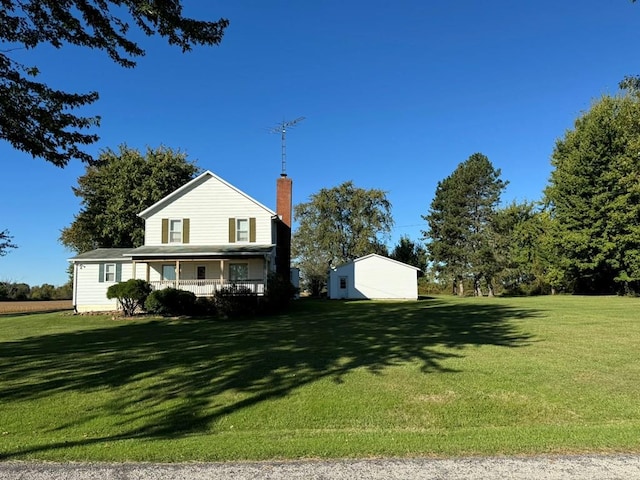 view of front of house with a front lawn and a porch