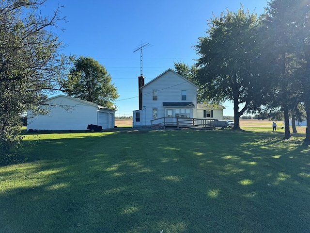 view of yard with a wooden deck