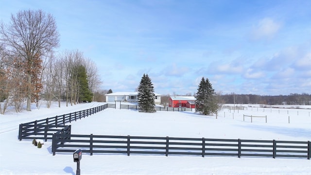 view of yard layered in snow