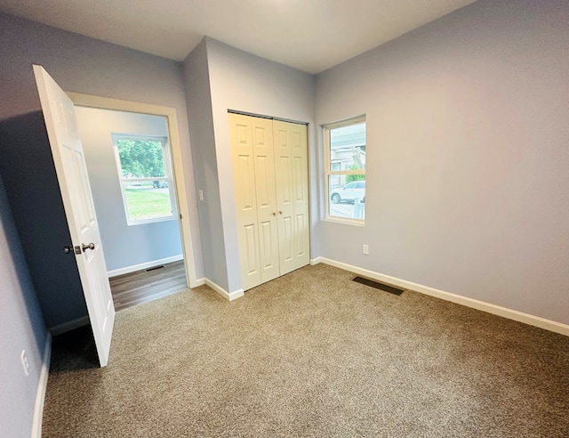 1030 Elm, Bucyrus, OH 44820 - unfurnished bedroom featuring carpet flooring and a closet