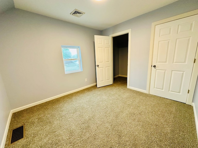 1030 Elm, Bucyrus, OH 44820 - unfurnished bedroom featuring carpet flooring and baseboards