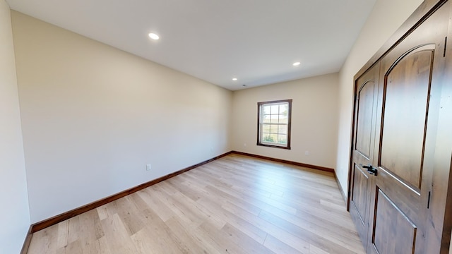 unfurnished bedroom featuring light hardwood / wood-style flooring