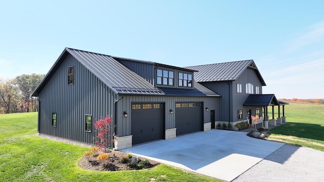 view of front facade with a front yard and a garage