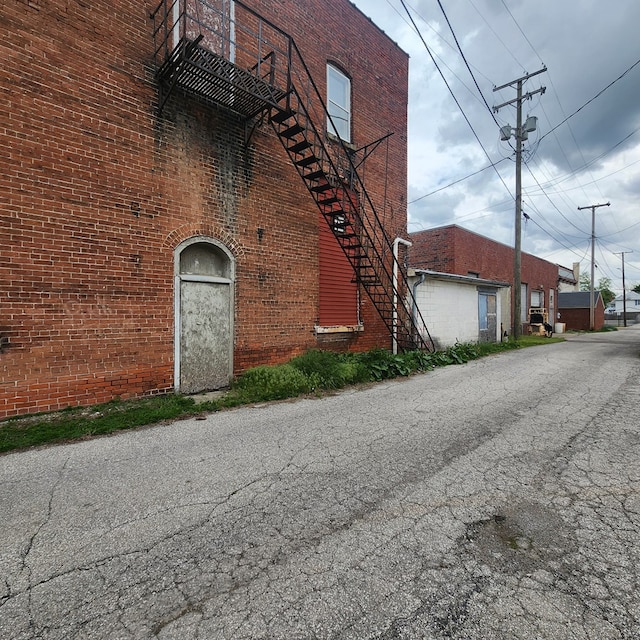 233 E Mansfield St, Bucyrus, OH 44820 - view of property exterior with brick siding