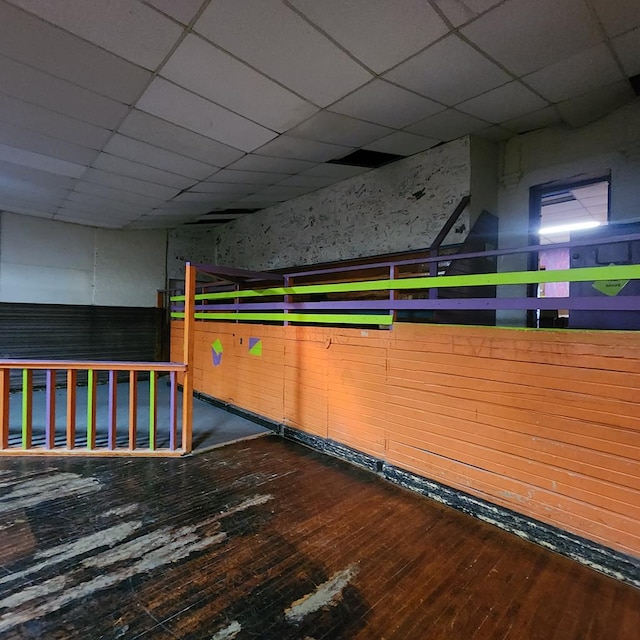 233 E Mansfield St, Bucyrus, OH 44820 - interior space featuring wood-type flooring and a paneled ceiling