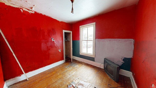 empty room featuring hardwood / wood-style floors