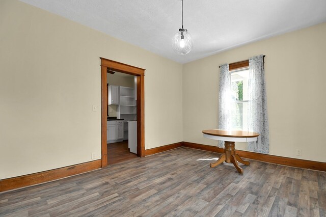 97 S Gamble St, Shelby, OH 44875 - empty room with wood finished floors and baseboards
