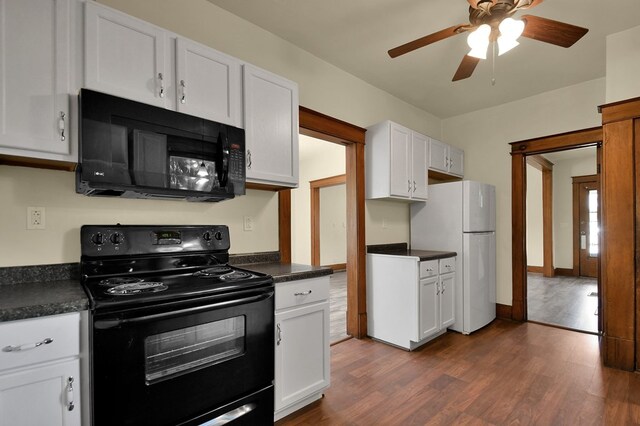 97 S Gamble St, Shelby, OH 44875 - kitchen featuring black appliances, dark countertops, a ceiling fan, and white cabinetry