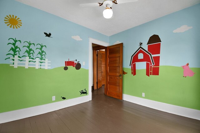 97 S Gamble St, Shelby, OH 44875 - empty room with wood finished floors, baseboards, and a ceiling fan