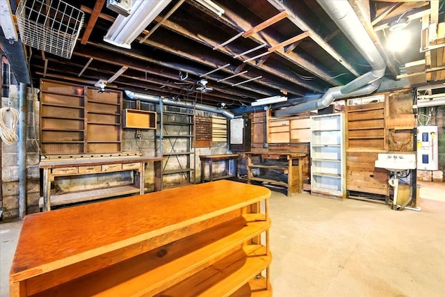 1051 Nazor Rd, Galion, OH 44833 - basement with a workshop area and electric water heater