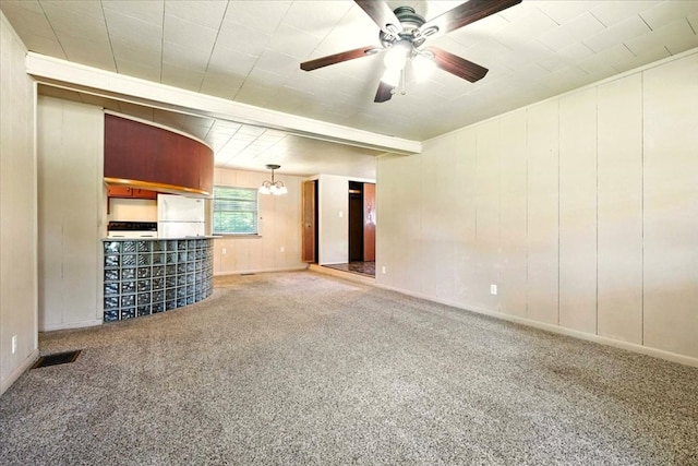 1051 Nazor Rd, Galion, OH 44833 - unfurnished living room featuring ceiling fan, carpet flooring, and a chandelier