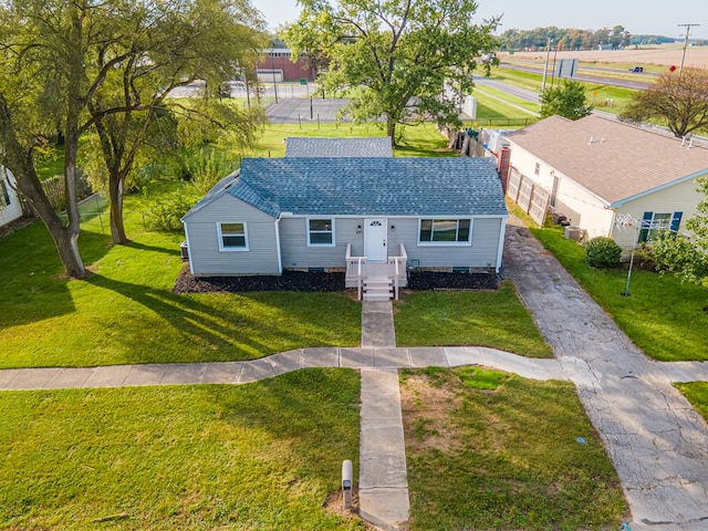 ranch-style house with a front yard