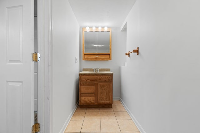 bathroom with vanity and tile patterned floors