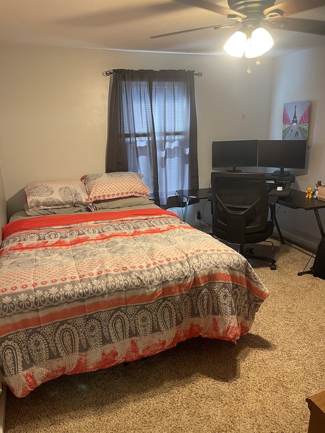 bedroom featuring carpet and ceiling fan