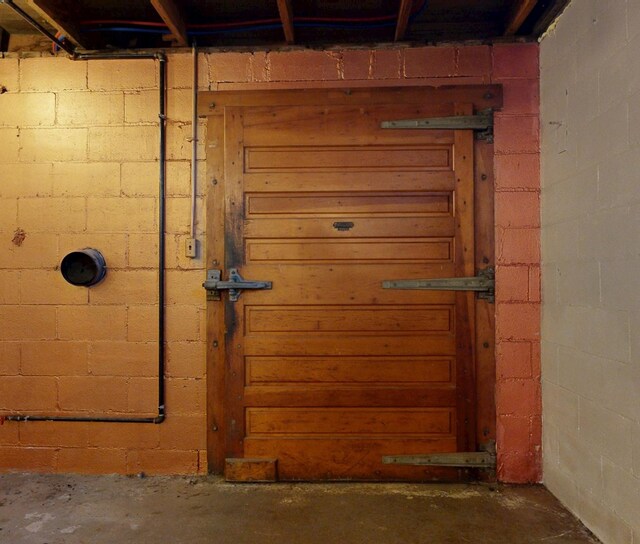 4 Post St, Shelby, OH 44875 - basement view of unfinished concrete flooring and concrete block wall