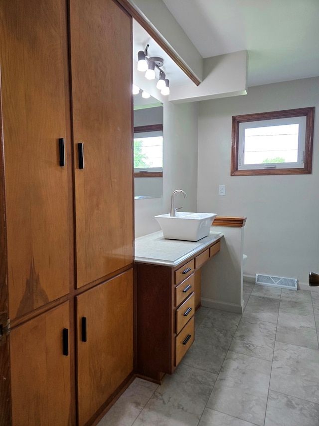 423 Beechwood Dr, Galion, OH 44833 - bathroom featuring vanity and baseboards