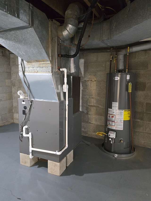 423 Beechwood Dr, Galion, OH 44833 - utility room featuring water heater and heating unit