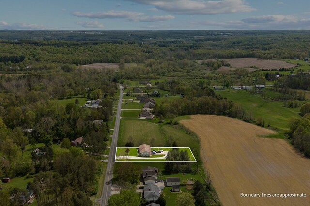 524.526 Rudy Rd, Mansfield, OH 44903 - overview of rural landscape with property boundaries highlighted and a heavily wooded area